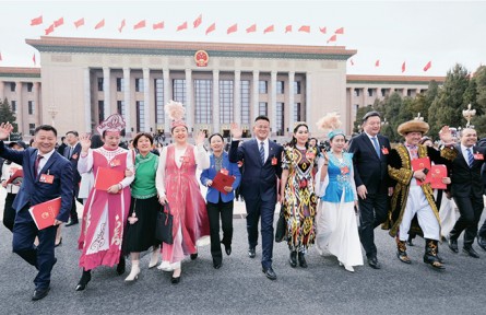 以发展全过程人民民主推动中国式现代化